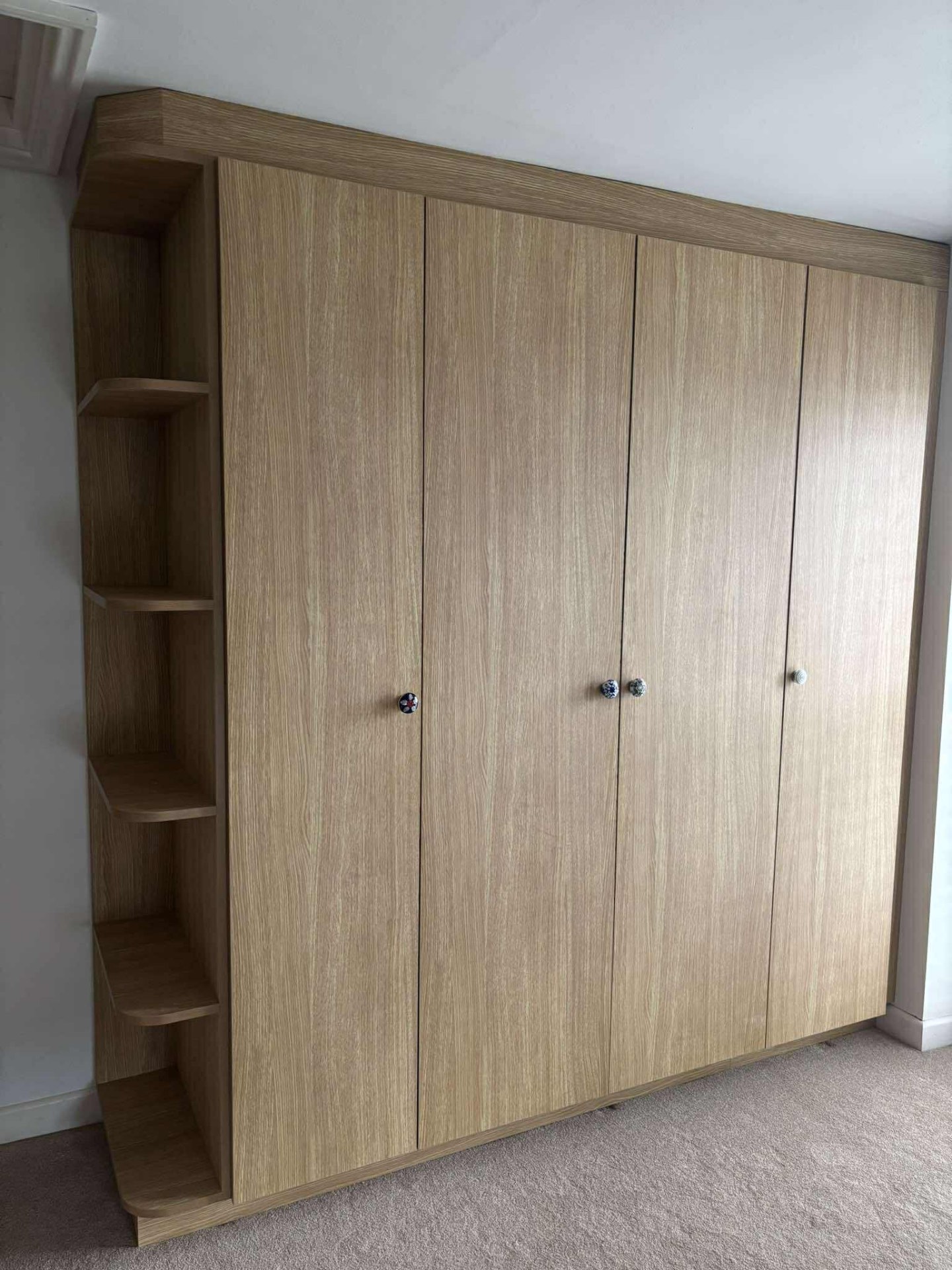 Bespoke oak fitted wardrobes after installation